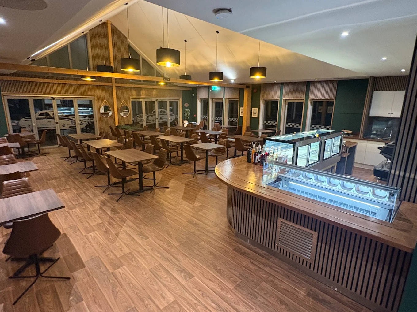 Inside The Drive at Haddo, a car-themed café in Aberdeenshire, near Aberdeen, with the counter and seating