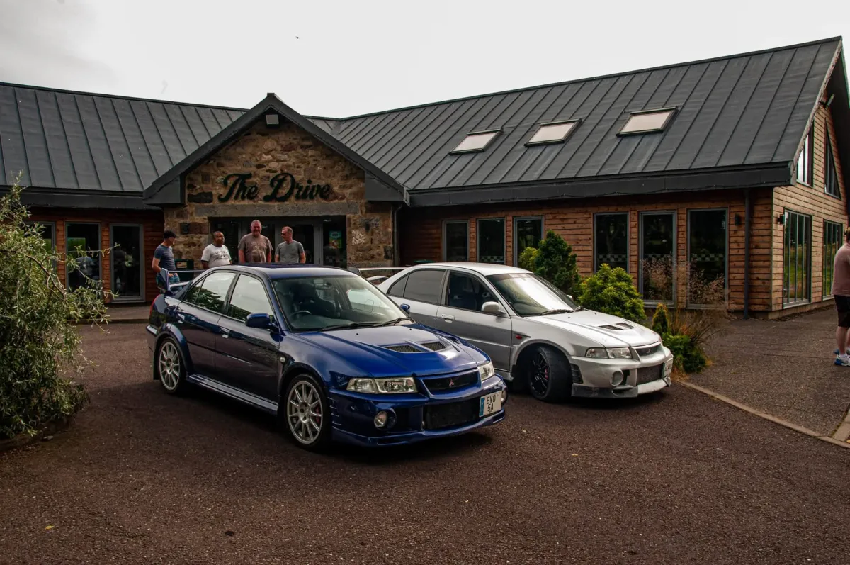 Mitsubishi Evos at a car meet outside The Drive at Haddo, Aberdeenshire